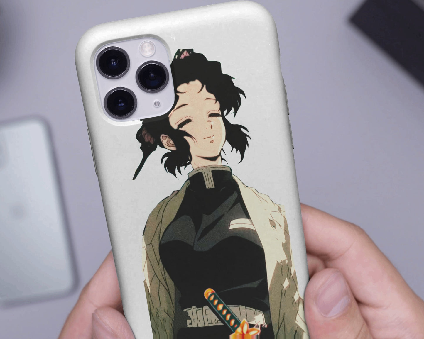 Purple and black iPhone case featuring Insect Hashira Shinobu Kocho from Demon Slayer with butterfly design