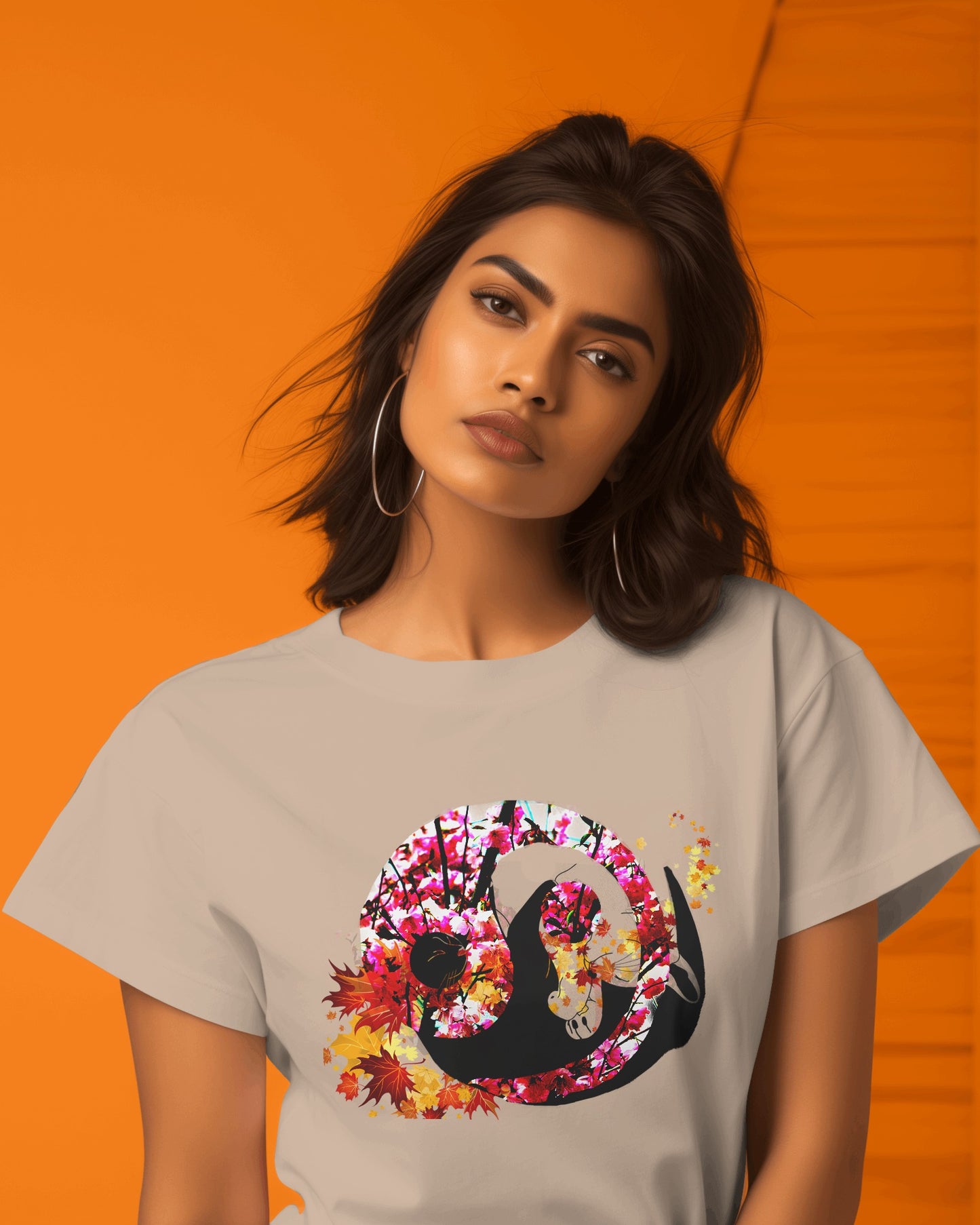 Soft Sand color t-shirt featuring artistic yin yang symbol created with black and white cats in circular balance