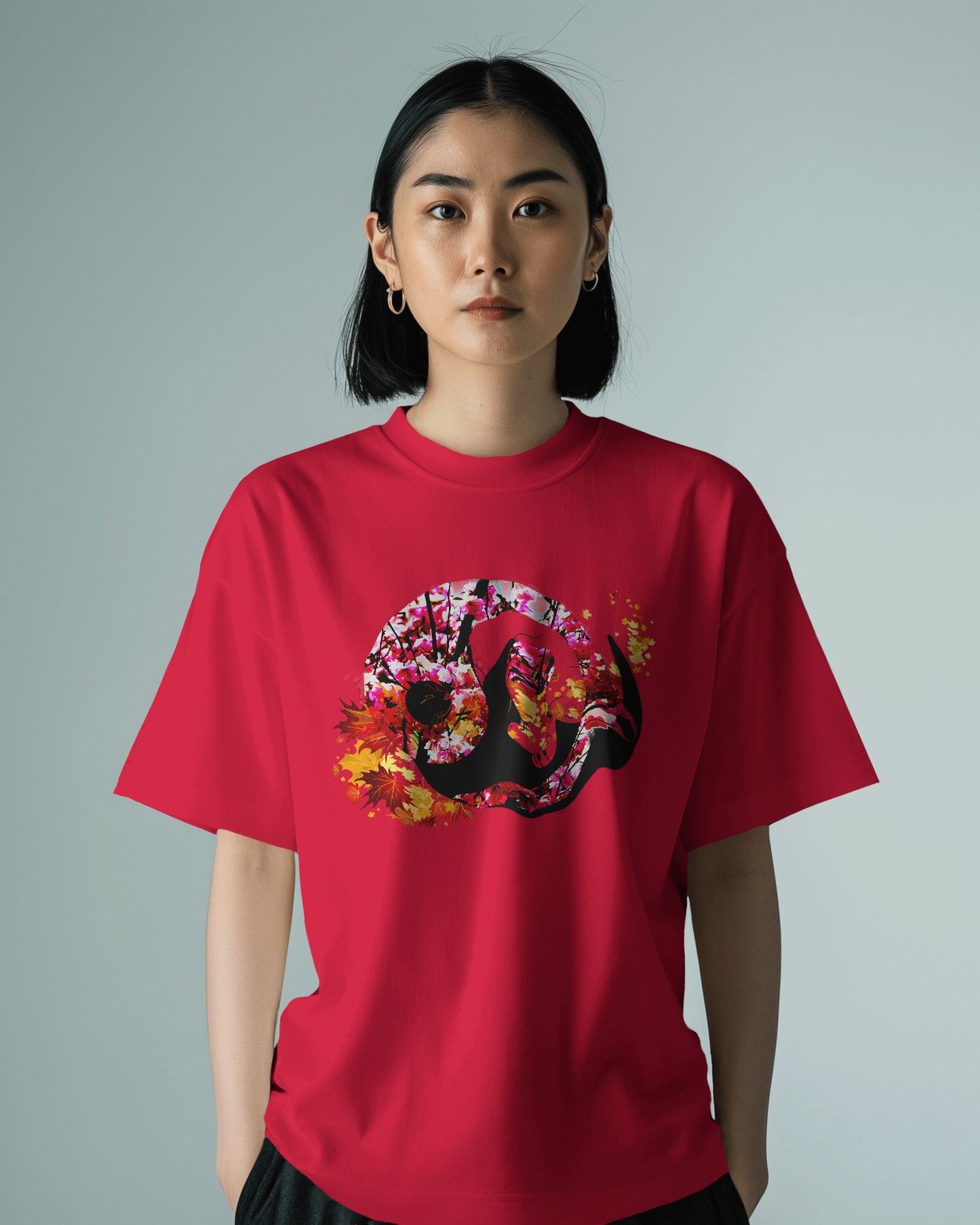 Soft Cardinal red color t-shirt featuring artistic yin yang symbol created with black and white cats in circular balance