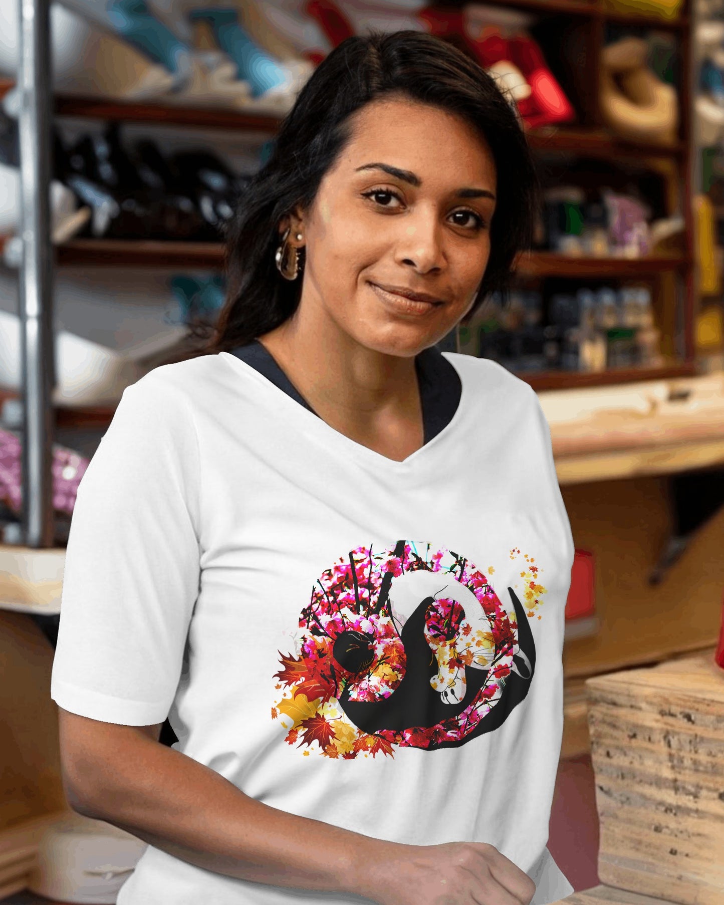 Soft White color t-shirt featuring artistic yin yang symbol created with black and white cats in circular balance