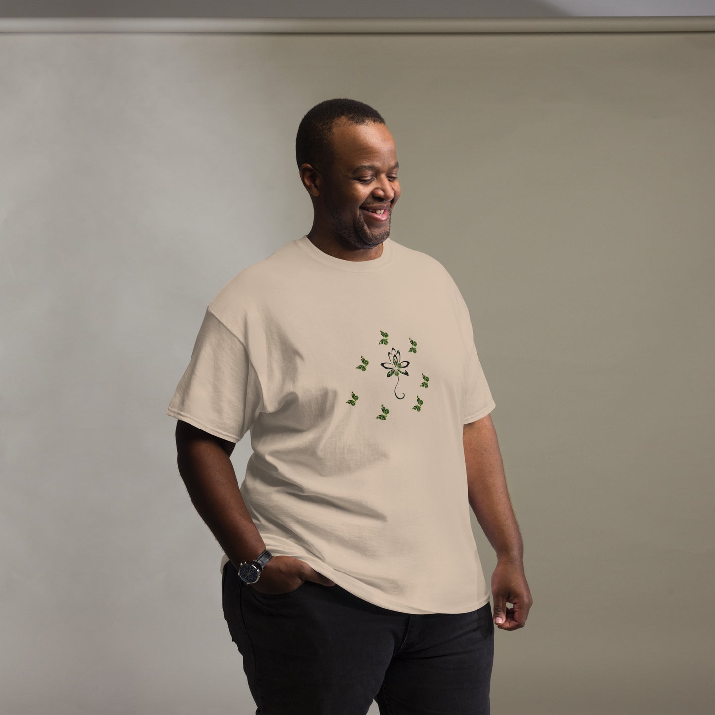 Eco-friendly organic cotton Sand color t-shirt with green environmental design featuring leaf patterns and nature symbols