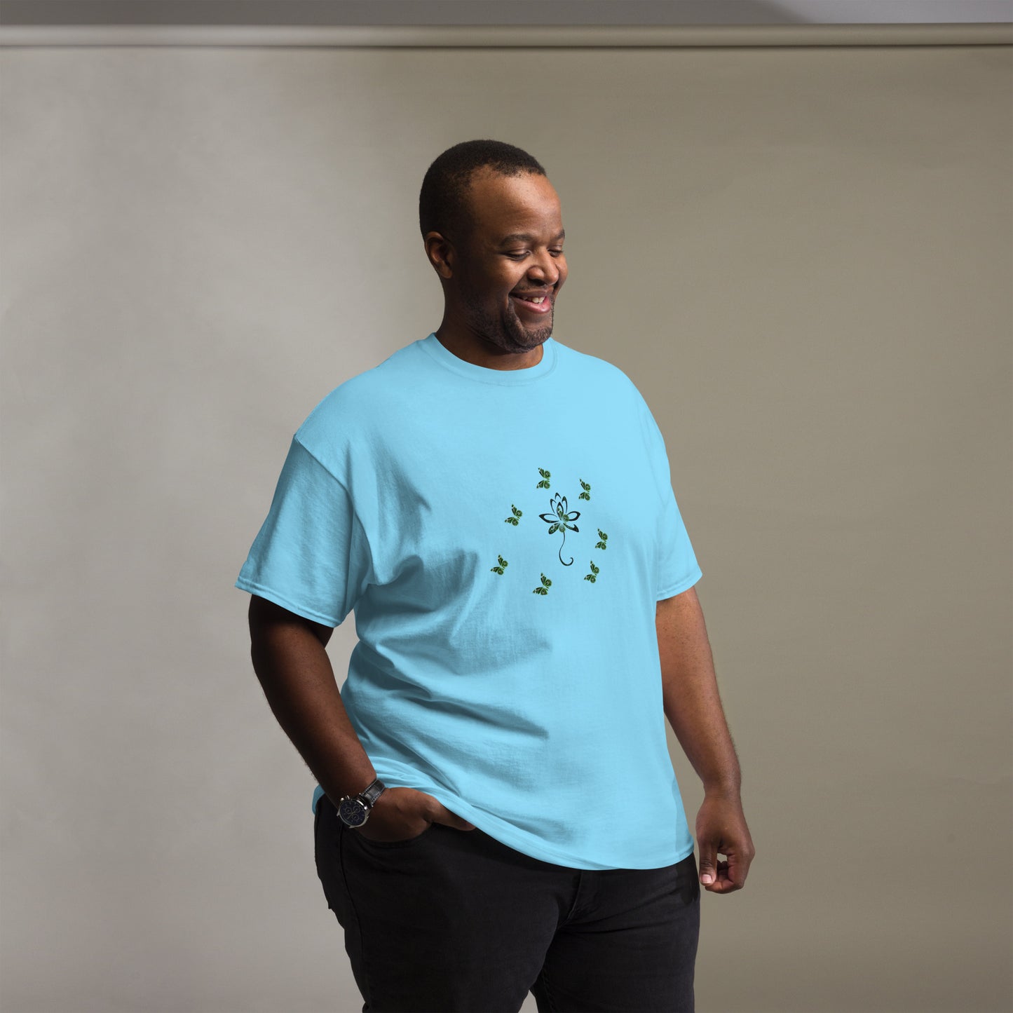 Eco-friendly organic cotton Sky Blue color t-shirt with green environmental design featuring leaf patterns and nature symbols