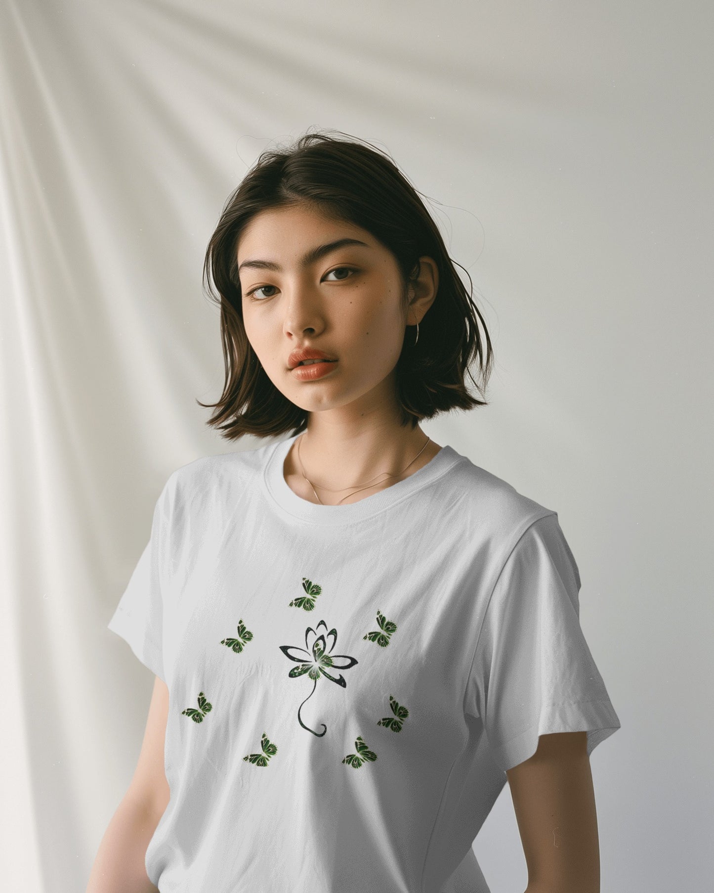 Eco-friendly organic cotton White color t-shirt with green environmental design featuring leaf patterns and nature symbols