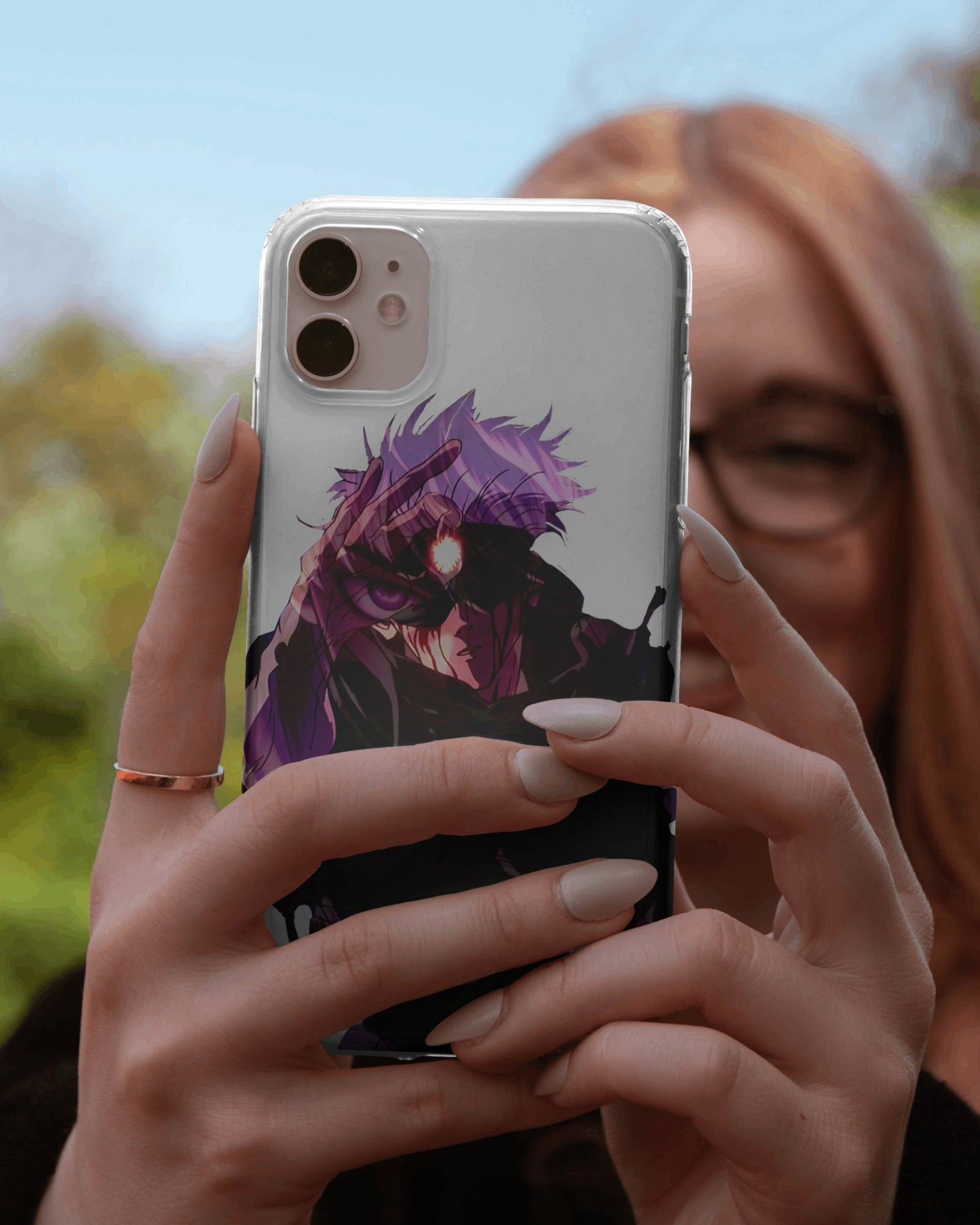 iPhone case featuring Gojo Satoru design with blue Six Eyes and Limitless technique elements from Jujutsu Kaisen