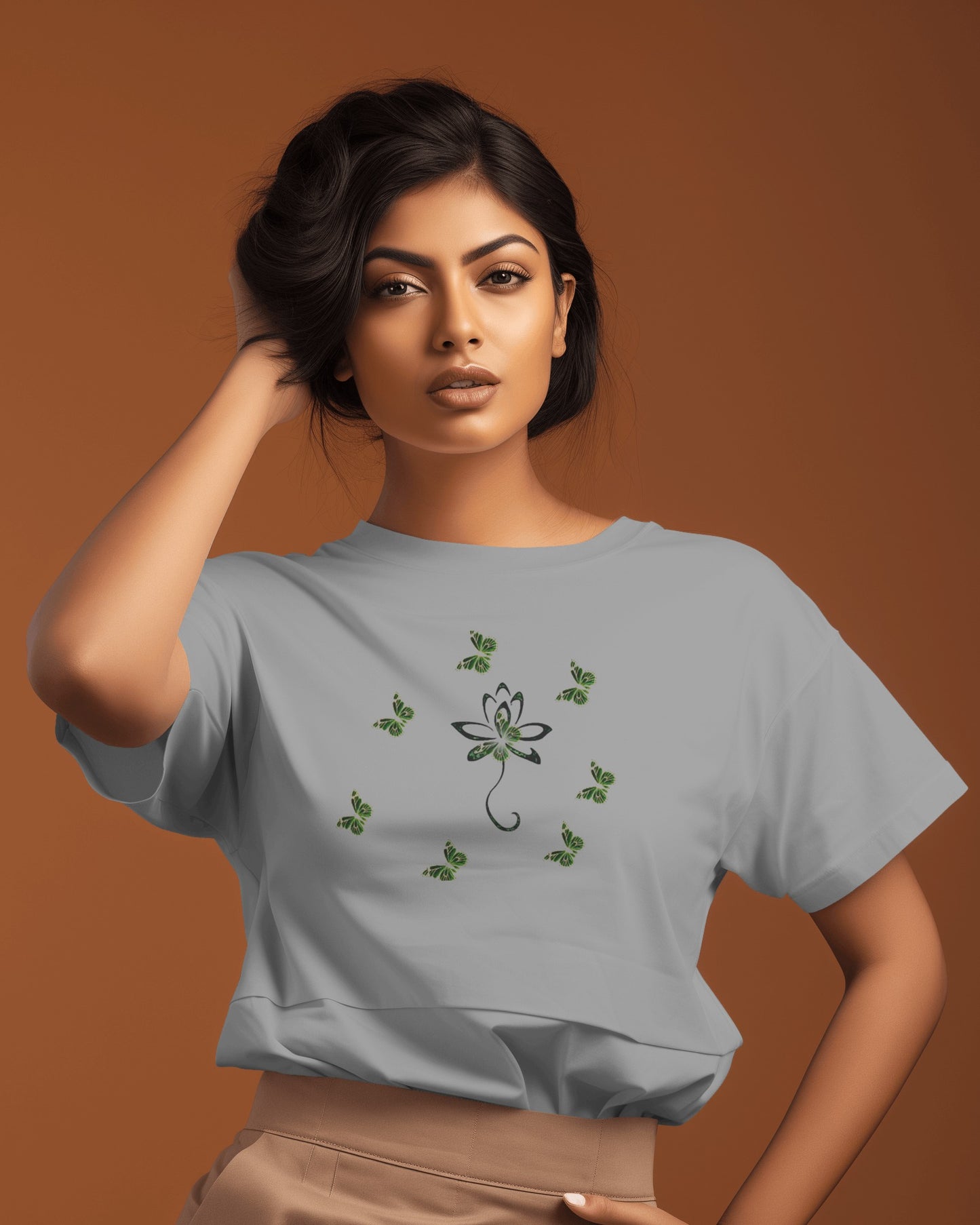 Eco-friendly organic cotton Carbon Grey color t-shirt with green environmental design featuring leaf patterns and nature symbols
