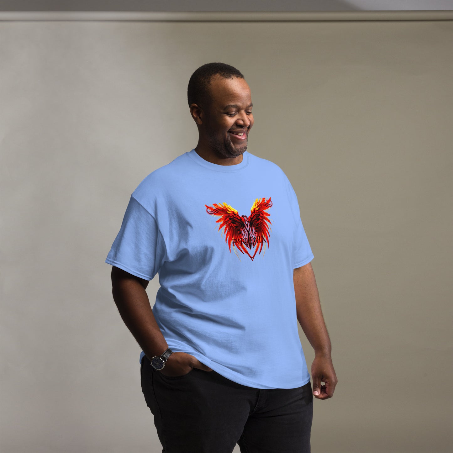 Black Phoenix t-shirt with red fiery immortal bird design on carolina 
blue cotton fabriclue
